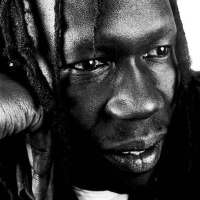 Geoffrey Oryema圖片照片_Geoffrey Oryema